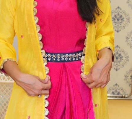 Pink Drape Dress With Yellow Jacket Having All Over Mirror Highlights.