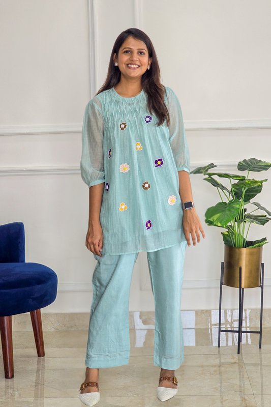 Aqua Blue Mul Chanderi Co Ord Set with Applique And Smock Detailing